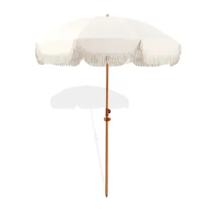 Sombrilla de patio grande con flecos y protección UV